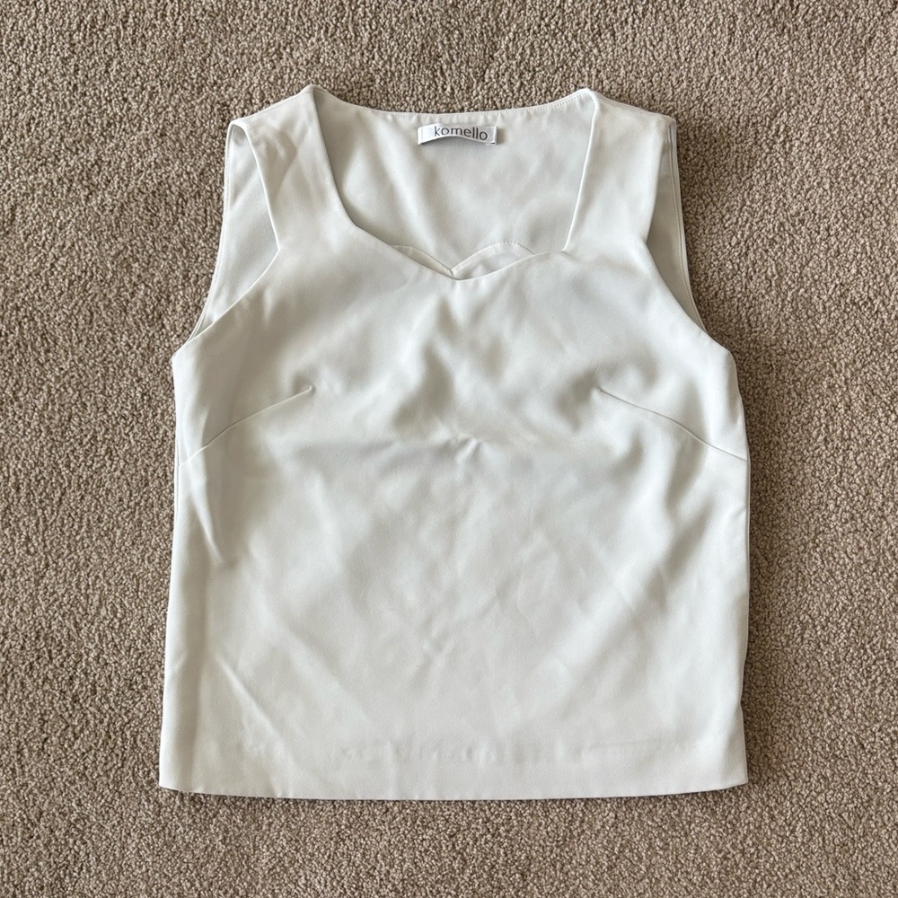 Off white structured sleeveless top